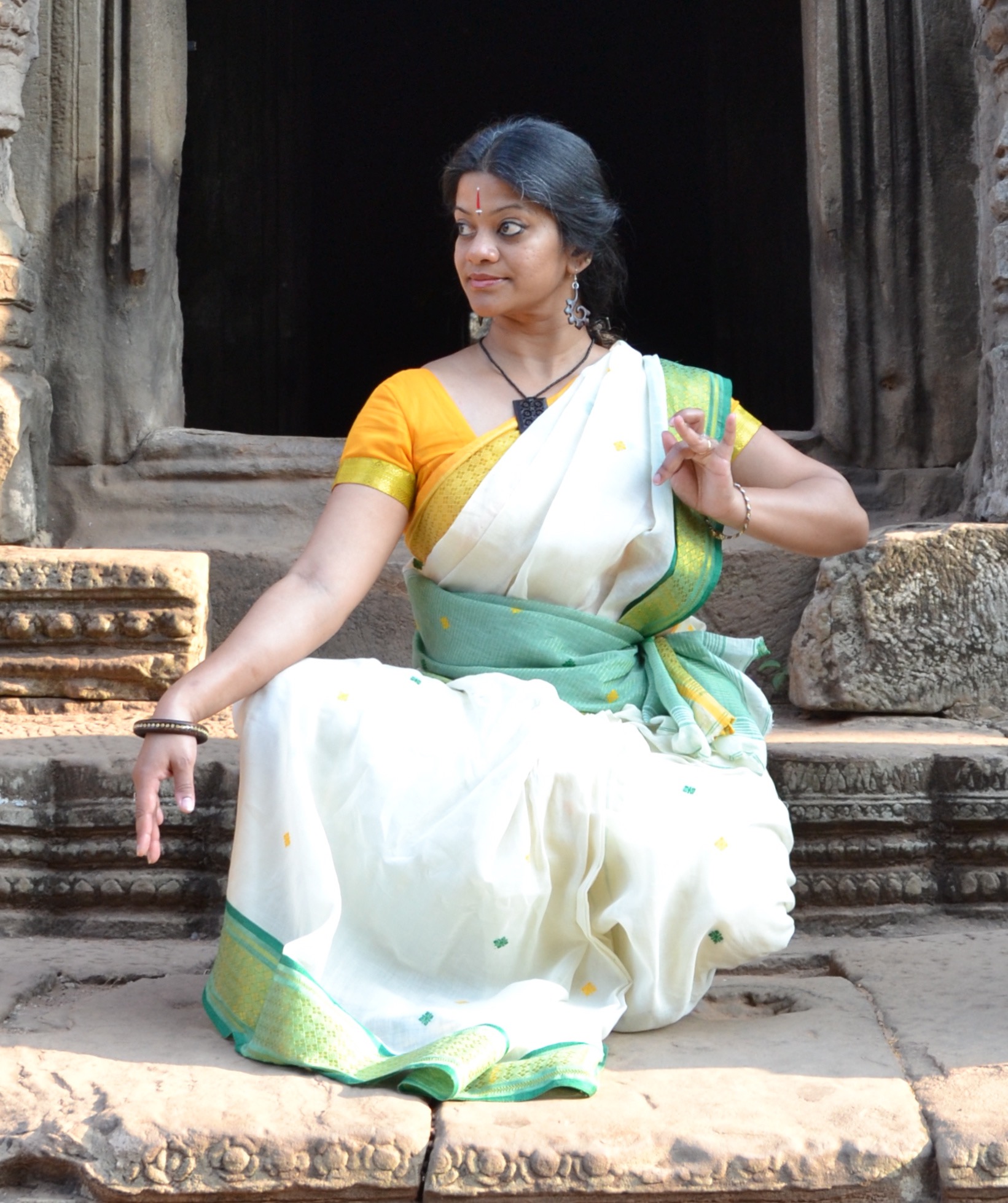 Dancer in kneeling pose